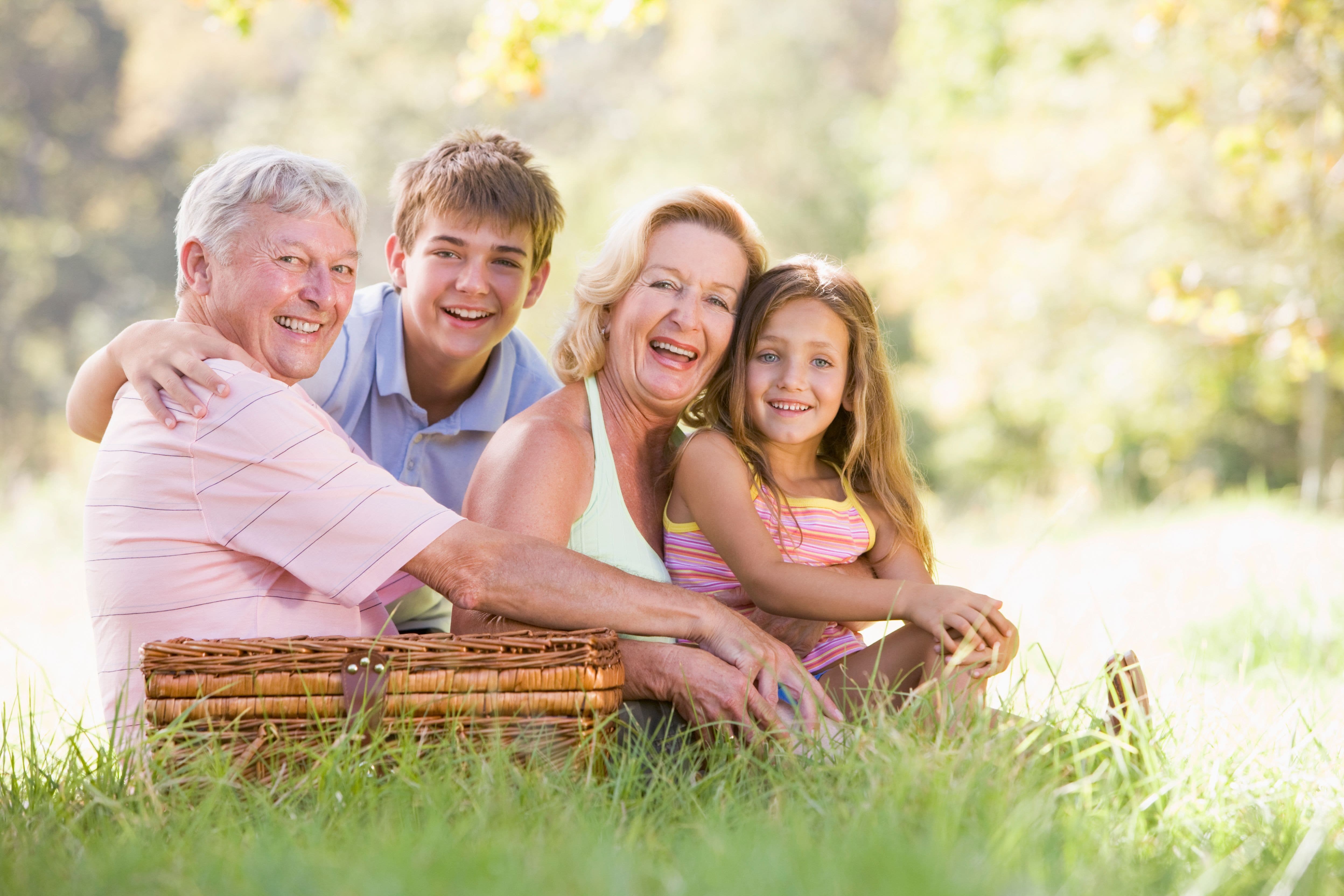 Happy grandparents enjoying their sweet grandchildren after moving to be closer to them!